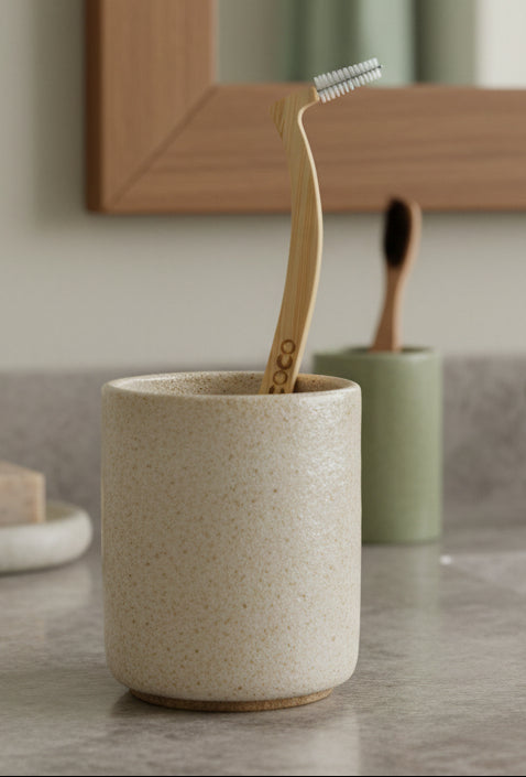 Wooden tongue scraper with 'LIVECOCO' branding on a white background